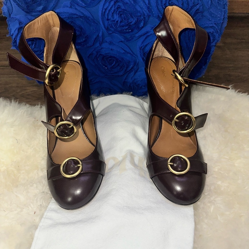 - [ ] Burgundy leather Chloé round-toe pumps with brass hardware, stacked heel